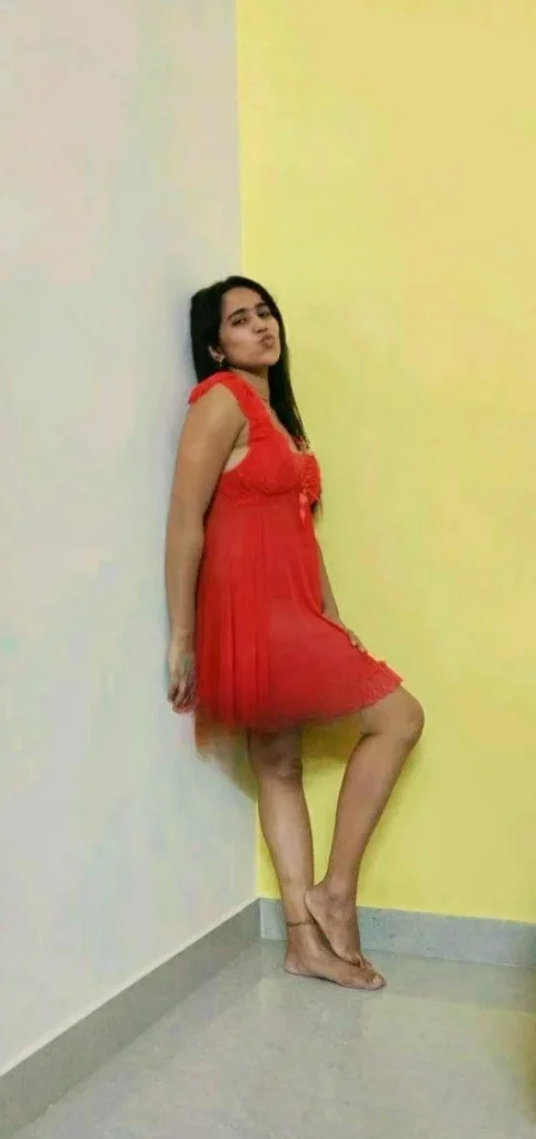 red sleeveless gown looking sexy girl