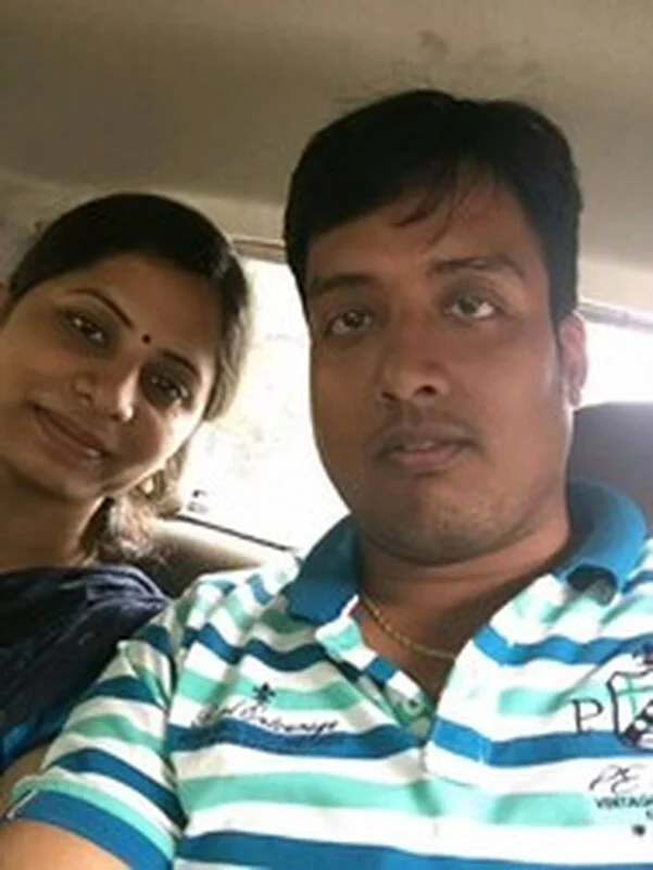 couple taking selfie in a car