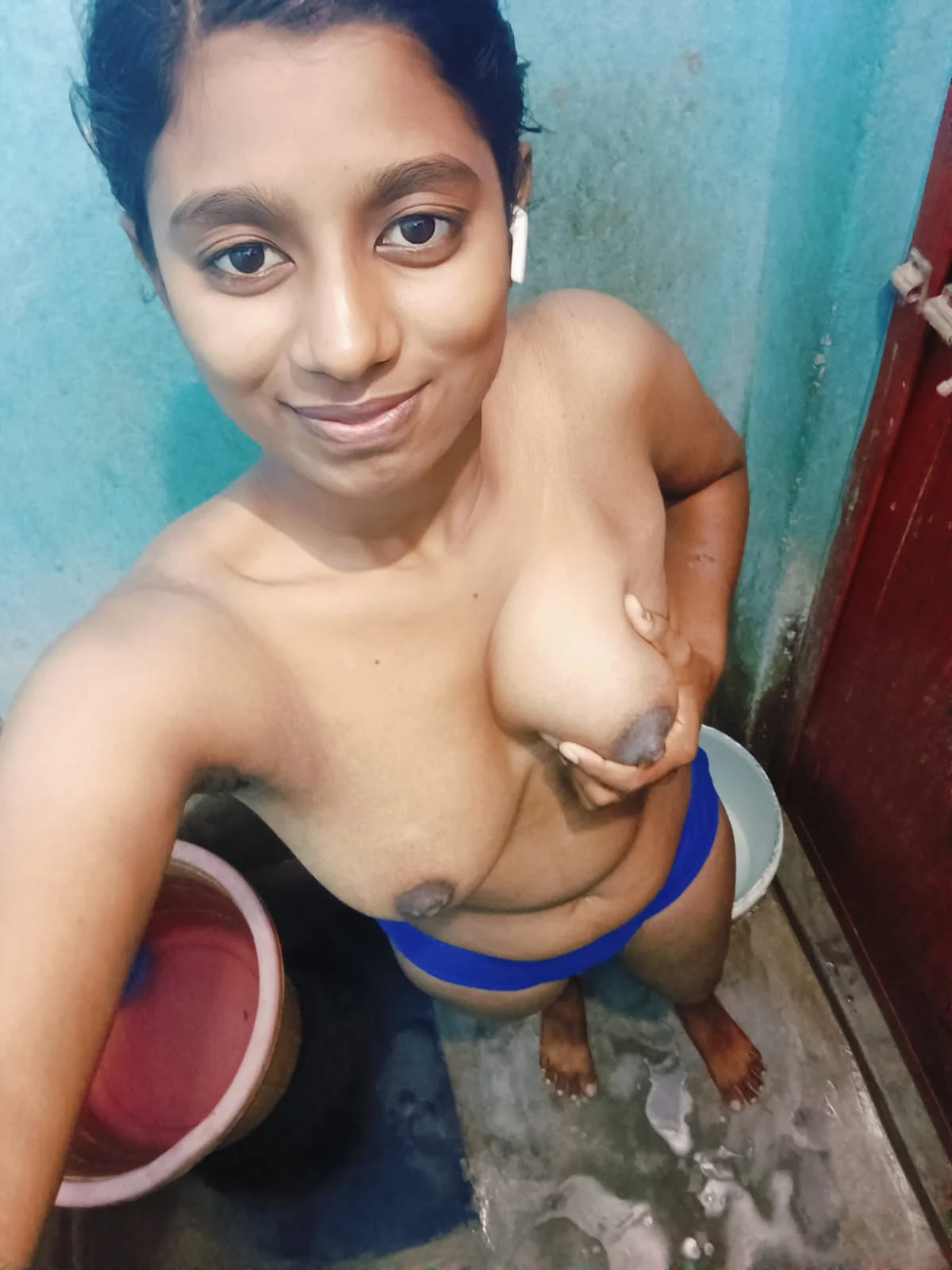 Topless selfies of a Kerala girl were shared 6 holding her breast and click slefi